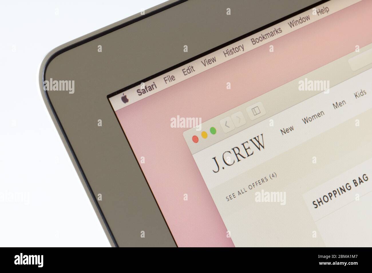 Closeup of the J.Crew logo on the website of the American retailer J.Crew Group, Inc. The company filed for bankruptcy on May 4, 2020. Stock Photo