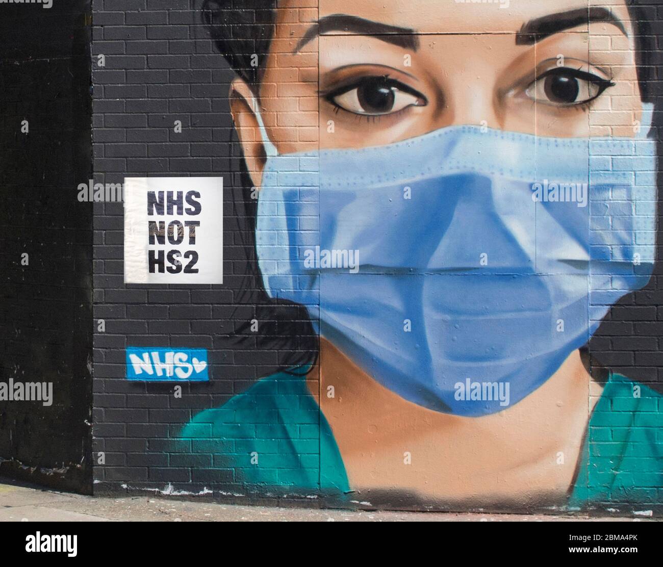 Pro NHS anti HS2 poster on a wall in London while in corona-virus lockdown London UK Stock Photo