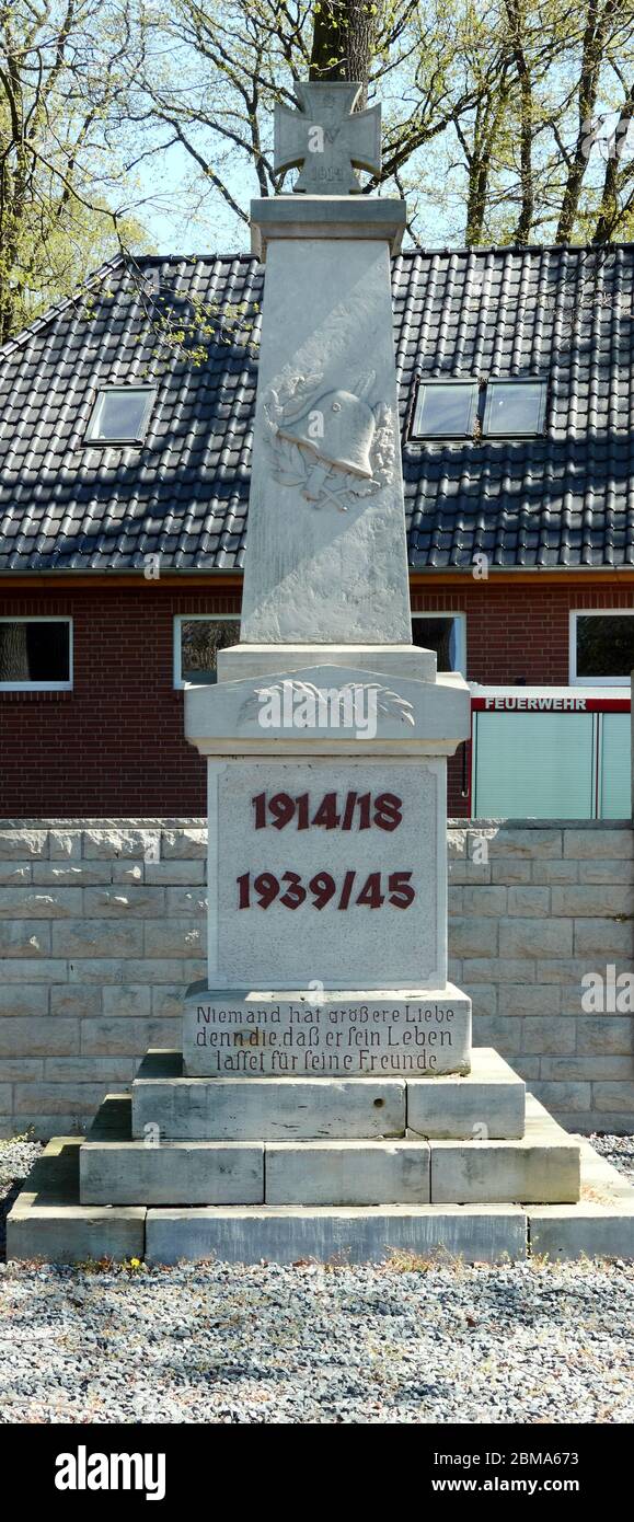 Gifhorn, Germany, April 20., 2020: Memorial and memorial plaques with the names of the fallen of the world wars in a German village Stock Photo