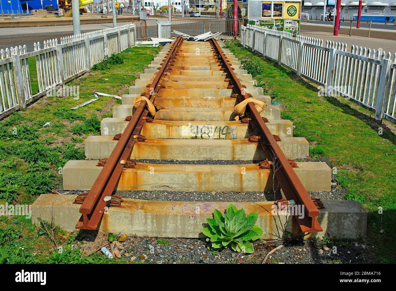 Rusty section of rail track and sleepers Stock Photo