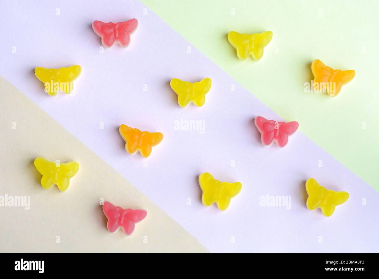 Colorful flat lay butterfly candy jellies Stock Photo