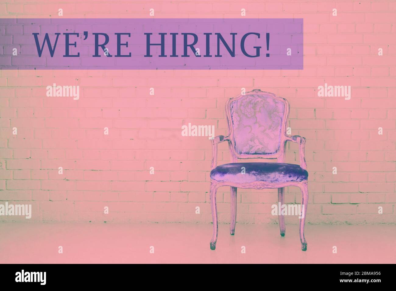 Concept of vacant chair. Vintage chair against brick wall. We are hiring retro design template