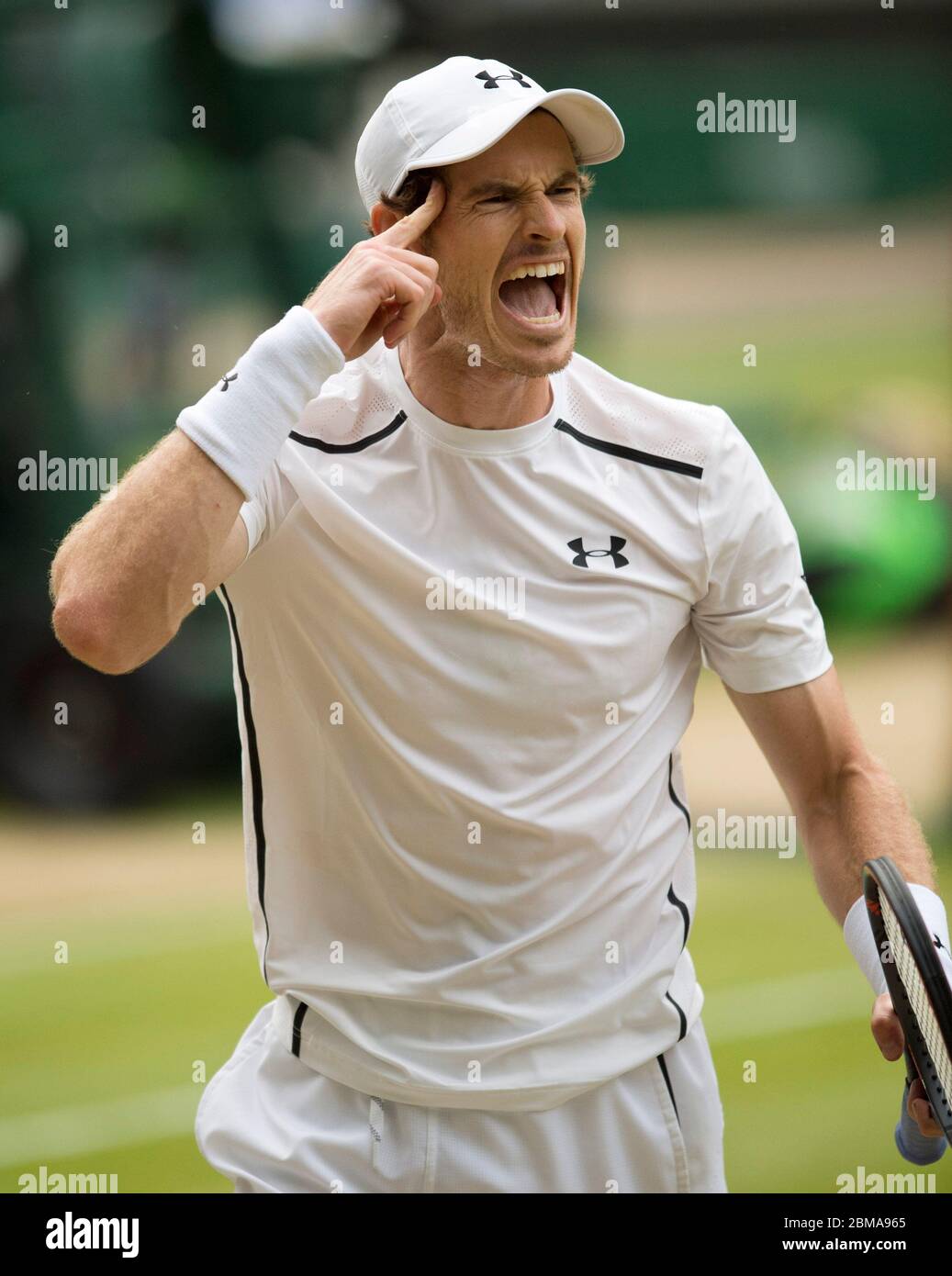 July 5th 2016, Wimbledon Championships London. Andy Murray shouts out during his Mens singles Quarter Final against Jo Wilfred Tsoga on Centre Court. Stock Photo