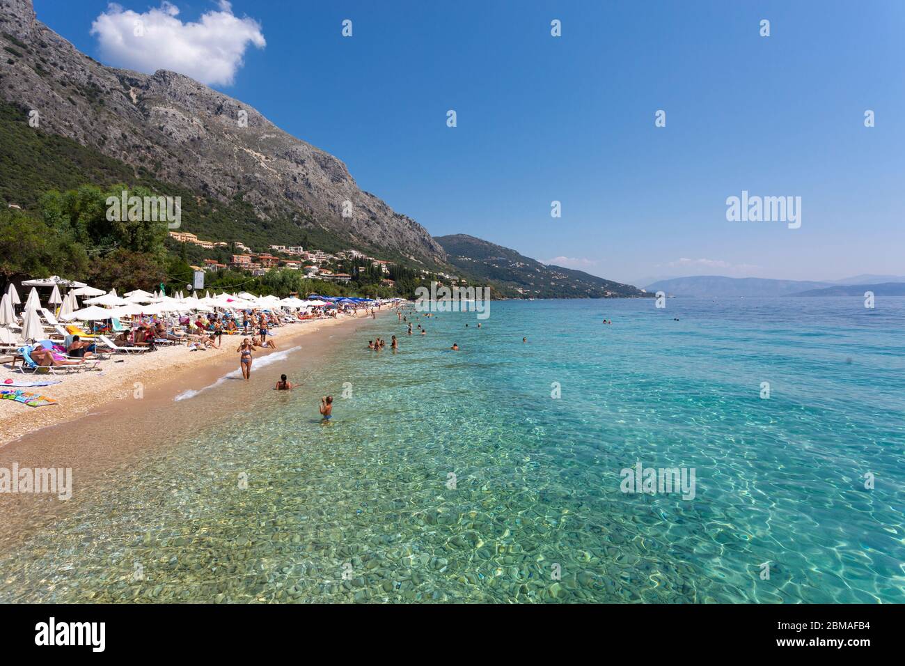 People swimming at Barbati Beach, Corfu Stock Photo