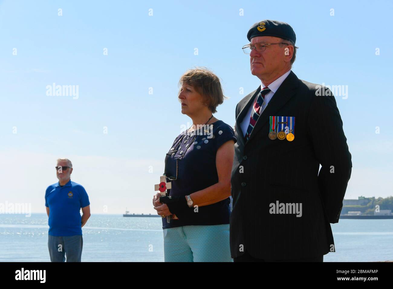 Weymouth, Dorset, UK.  8th May 2020. A two minutes silence and wreath laying at the War Memorial on the seafront at Weymouth in Dorset for the 75th anniversary of VE Day during the coronavirus lockdown.  Picture Credit: Graham Hunt/Alamy Live News Stock Photo