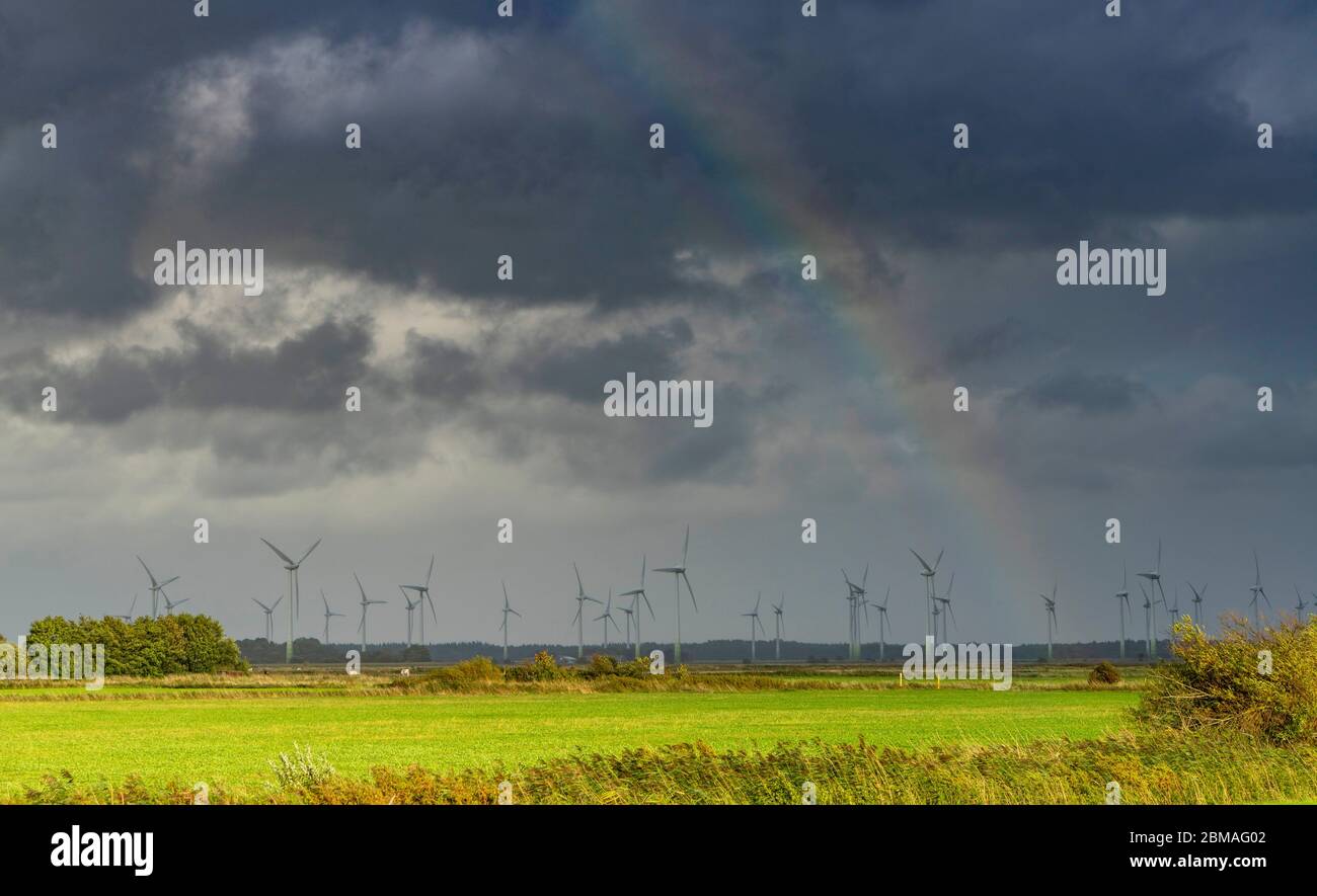 wind park and rainbow in East Frisia, Germany, Lower Saxony, East Frisia Stock Photo