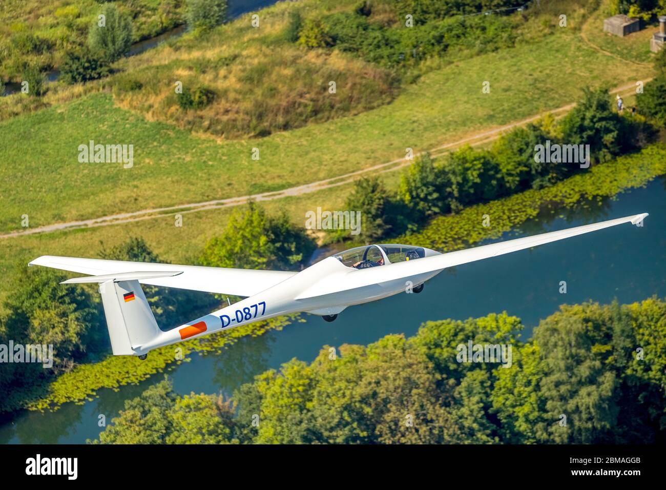 sailplane ASK21 in flight over river Lippe, training of landing, 04.08.2019, aerial view, Germany, North Rhine-Westphalia, Ruhr Area, Hamm Stock Photo