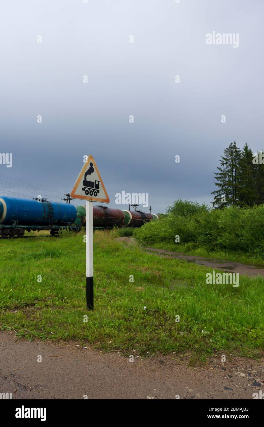 Road Sign Railway Crossing Without Barrier On The Background Of A Train With Oil Tanks And A Country Road Vertical Orientation Stock Photo Alamy Road Sign Railway Crossing Without Barrier On The Background Of A Train With Oil Tanks And A Country Road Vertical Orientation Stock Photo Alamy