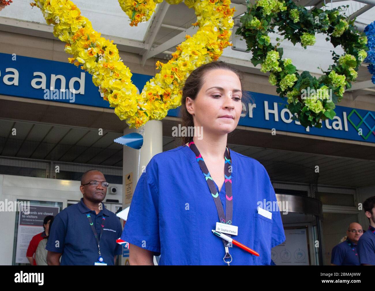 London, UK. 8th May, 2020. Nurses, doctors and care workers at Chelsea and Westminster Hospital hold 2 minute's silence for VE day. Victory in Europe day was celebrated on May 8th 1945. Credit: Mark Thomas/Alamy Live News Stock Photo