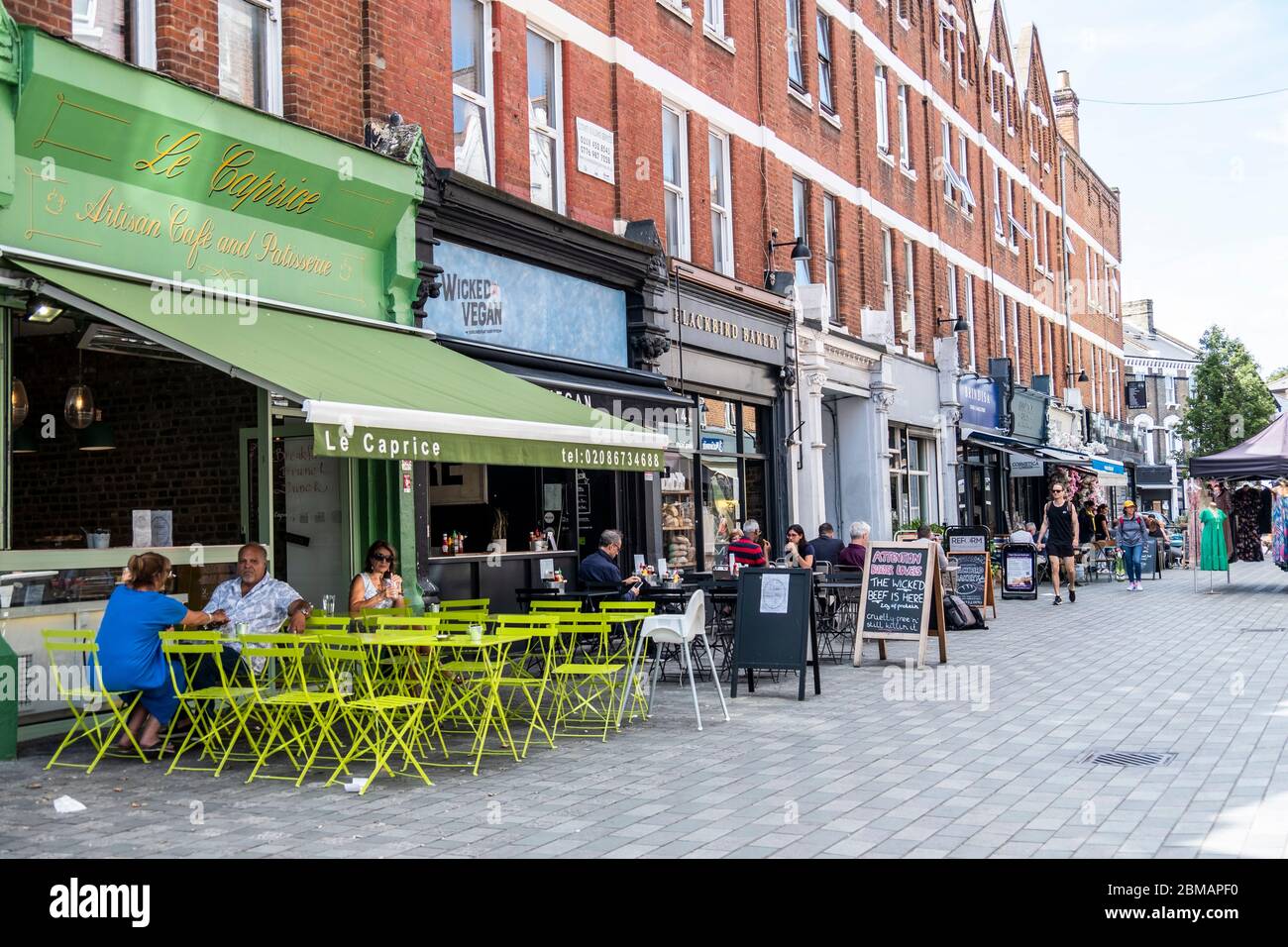 LONDON- High street shopping scene in Balham, an area of south west London Stock Photo