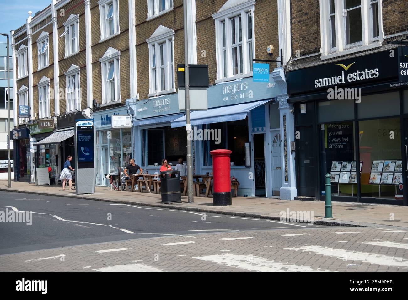 LONDON- High street shopping scene in Balham, an area of south west London Stock Photo