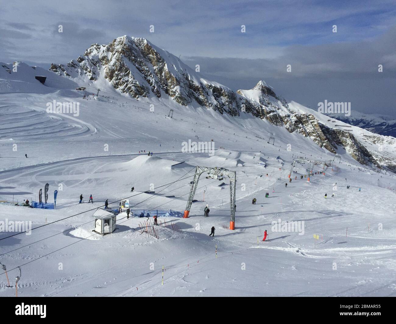 Kaprun, Austria: Kitzsteinhorn glacier in winter season ski lifts and  snowboard fun park Stock Photo - Alamy