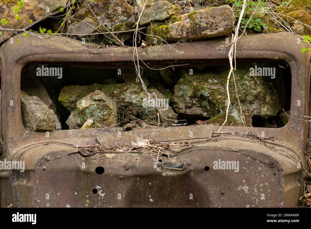 Old Cars Buried For Erosion Control Stock Photo