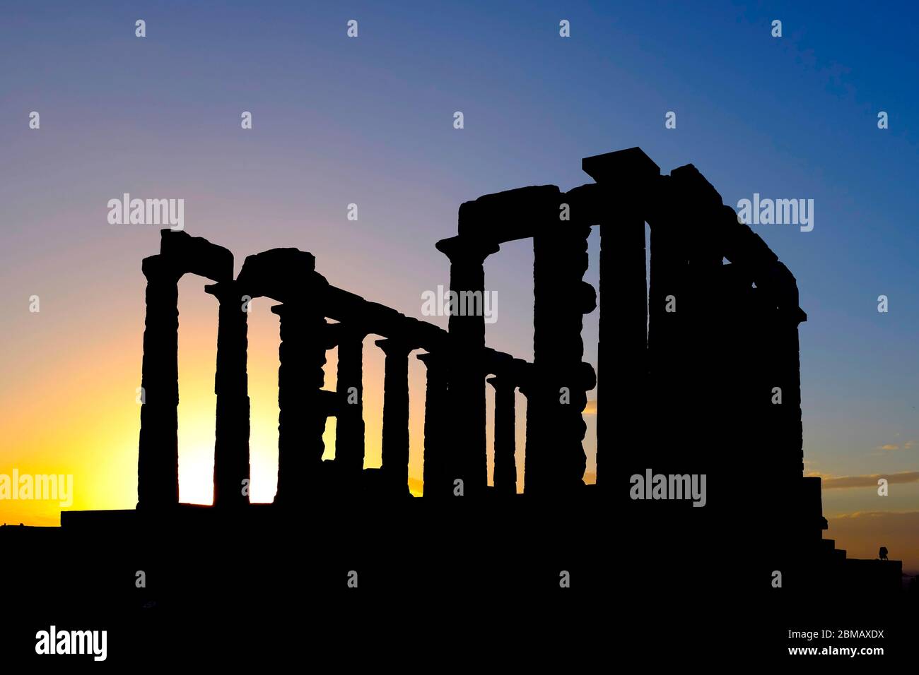 Silhouette of the Ruins of the Temple of Poseidon at Cape Sounion, Attica Peninsula, Greece Stock Photo