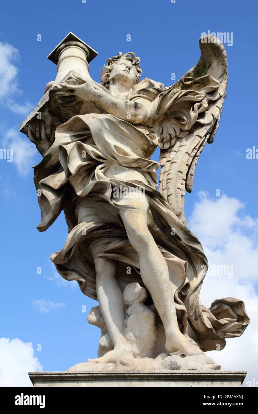 Rome, Italy. One of the angels at famous Ponte Sant' Angelo bridge. Angel with the Column statue by Antonio Raggi. Stock Photo