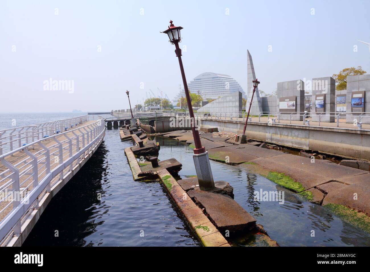 KOBE, JAPAN - APRIL 24, 2012: Ruined Meriken Wharf in Kobe. It was damaged by the Great Hanshin Earthquake in 1995 and is preserved as a memorial. Stock Photo