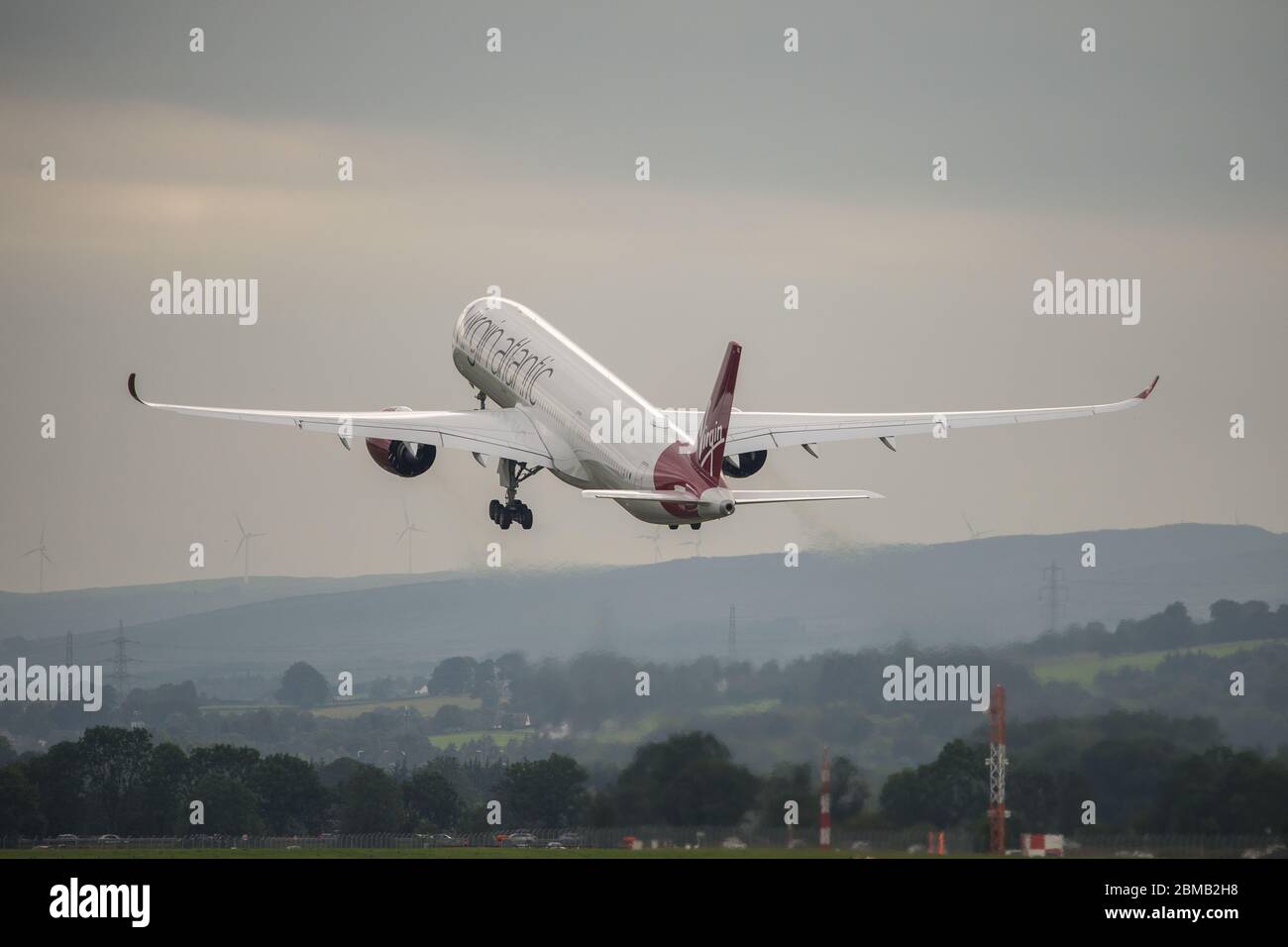 Glasgow, UK. 25 August 2019. Pictured: Virgin Atlantic Airbus A350-1000 aircraft seen at Glasgow International Airport for pilot training. Virgin's brand new jumbo jet boasts an amazing new 'loft' social space with sofas in business class, and aptly adorned by the registration G-VLUX. The entire aircraft will also have access to high-speed Wi-Fi. Virgin Atlantic has ordered a total of 12 Airbus A350-1000s. They are all scheduled to join the fleet by 2021 in an order worth an estimated $4.4 billion (£3.36 billion). Credit: Colin Fisher/Alamy Live News. Stock Photo