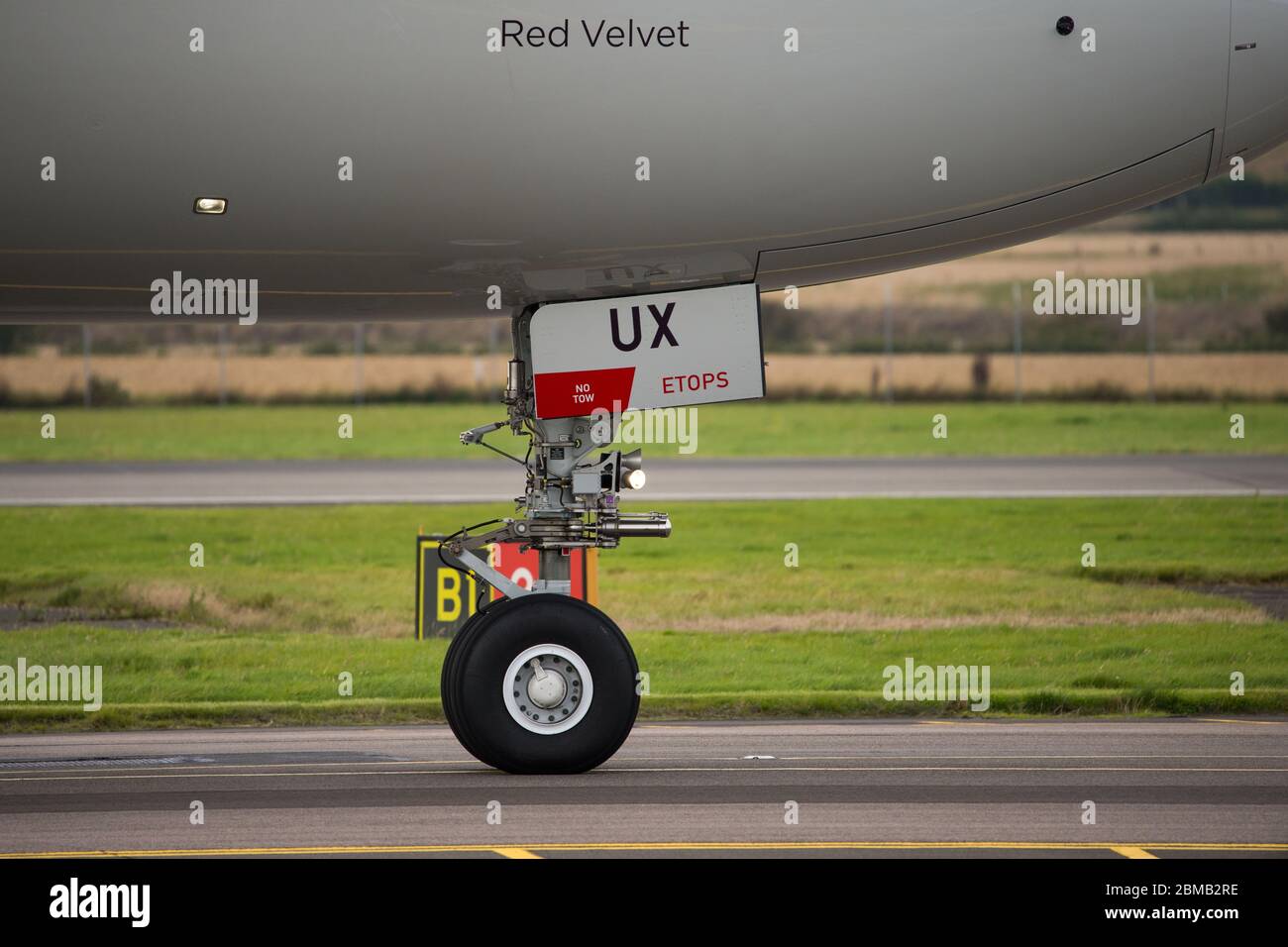 Glasgow, UK. 25 August 2019.  Pictured: Virgin Atlantic Airbus A350-1000 aircraft seen at Glasgow International Airport for pilot training. Virgin's brand new jumbo jet boasts an amazing new 'loft' social space with sofas in business class, and aptly adorned by the registration G-VLUX. The entire aircraft will also have access to high-speed Wi-Fi. Virgin Atlantic has ordered a total of 12 Airbus A350-1000s. They are all scheduled to join the fleet by 2021 in an order worth an estimated $4.4 billion (£3.36 billion). Credit: Colin Fisher/Alamy Live News. Stock Photo