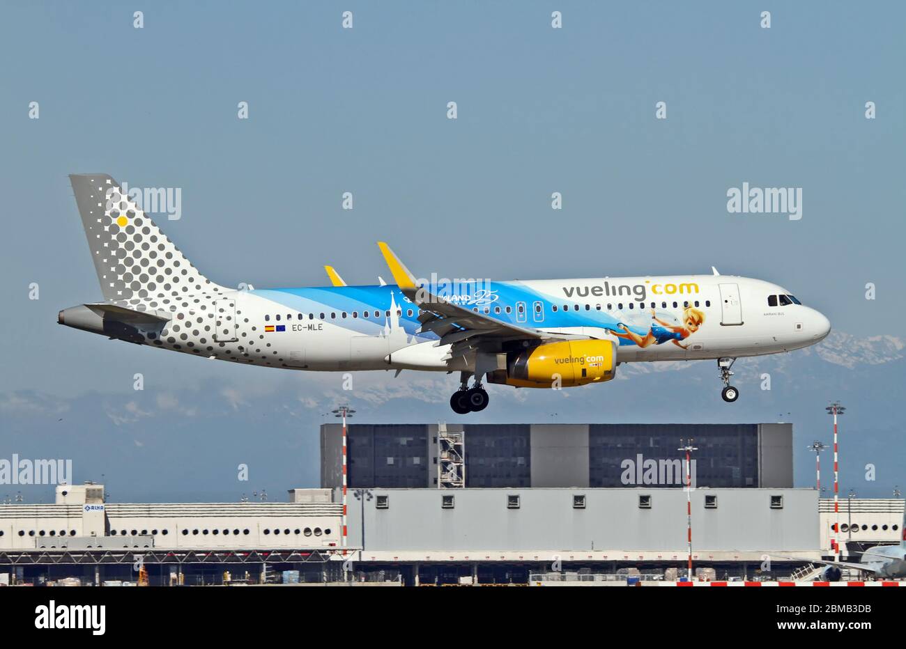 EC-MLE Vueling Airbus A320-232(WL) with Disneyland Paris - 25 Years Livery at Malpensa (MXP / LIMC), Milan, Italy Stock Photo