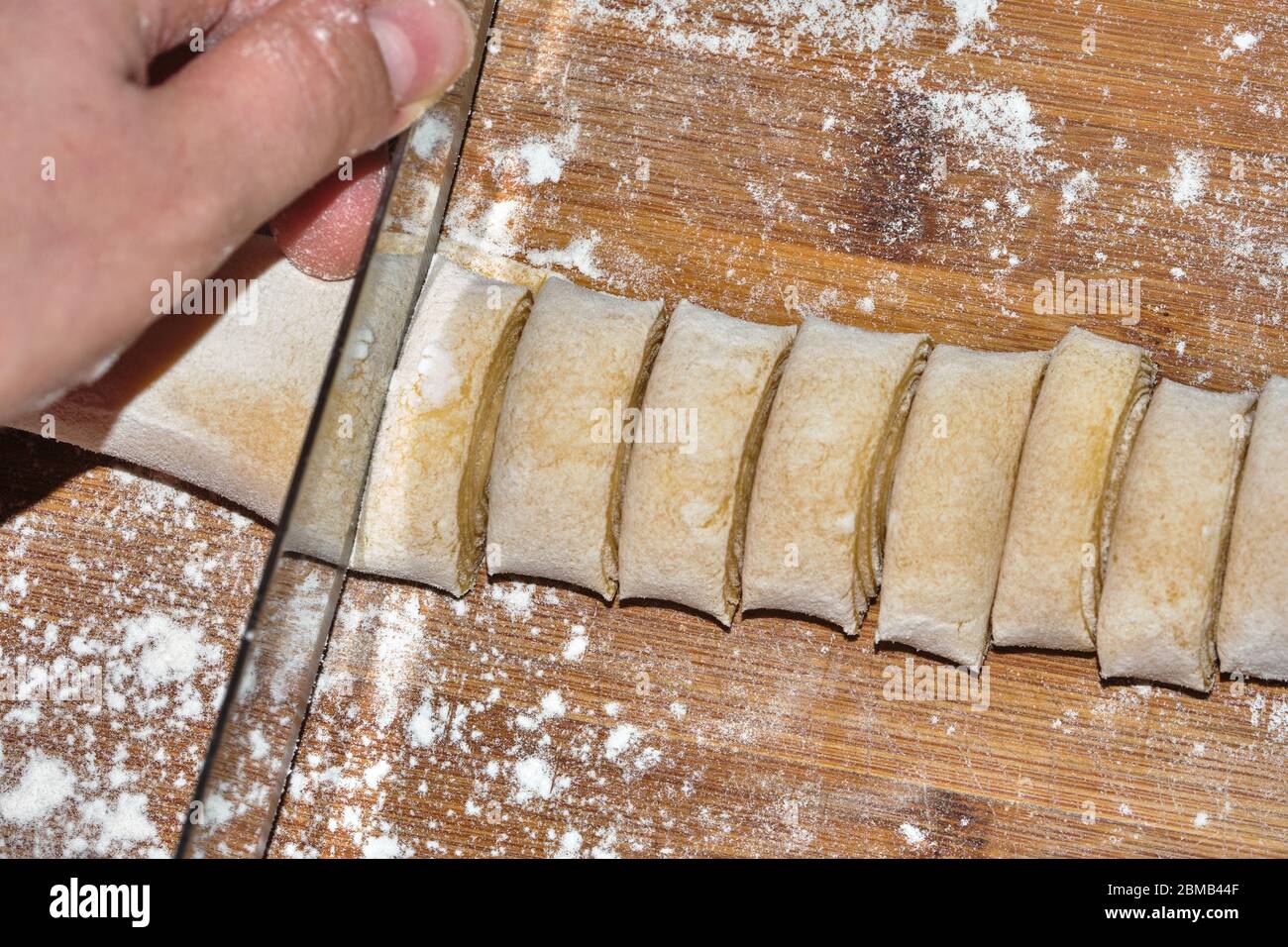 Raw Italian homemade tagliatelle pasta, made with eggs and flour Stock Photo