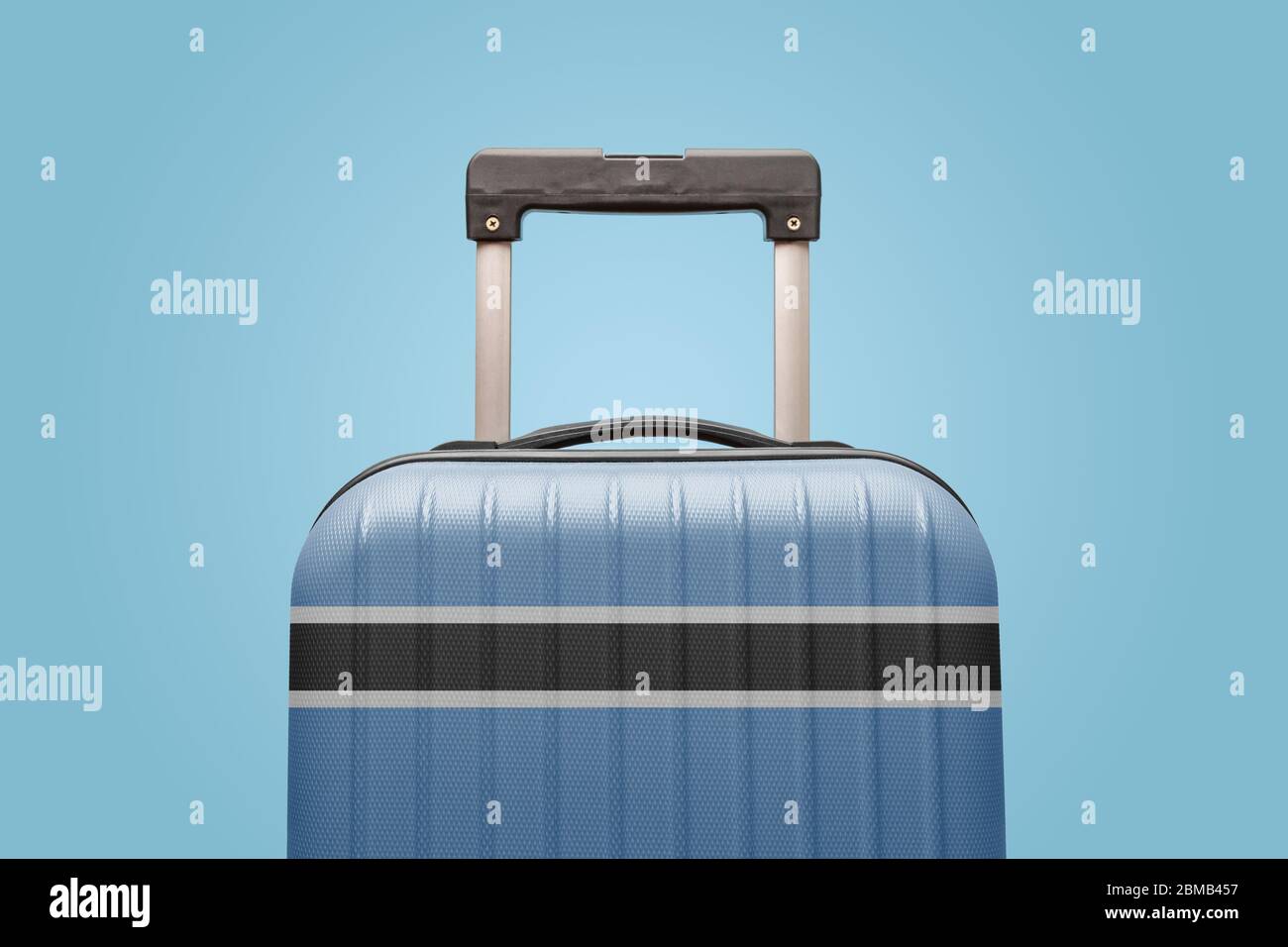 Suitcase with Botswanan flag design travel Africa concept. Stock Photo