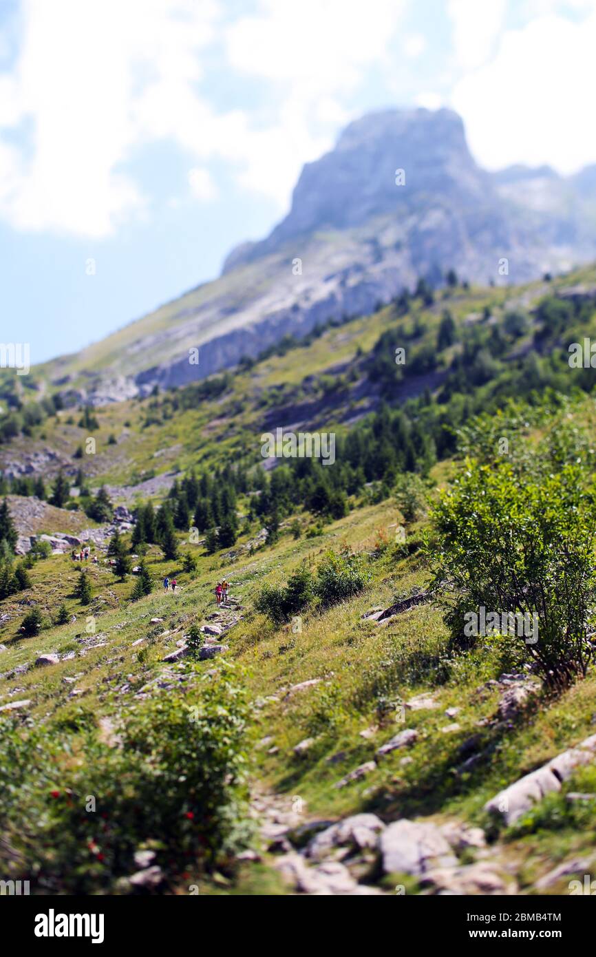 Hikers in the Aravis Range (Chaîne des Aravis), French Alps. Stock Photo