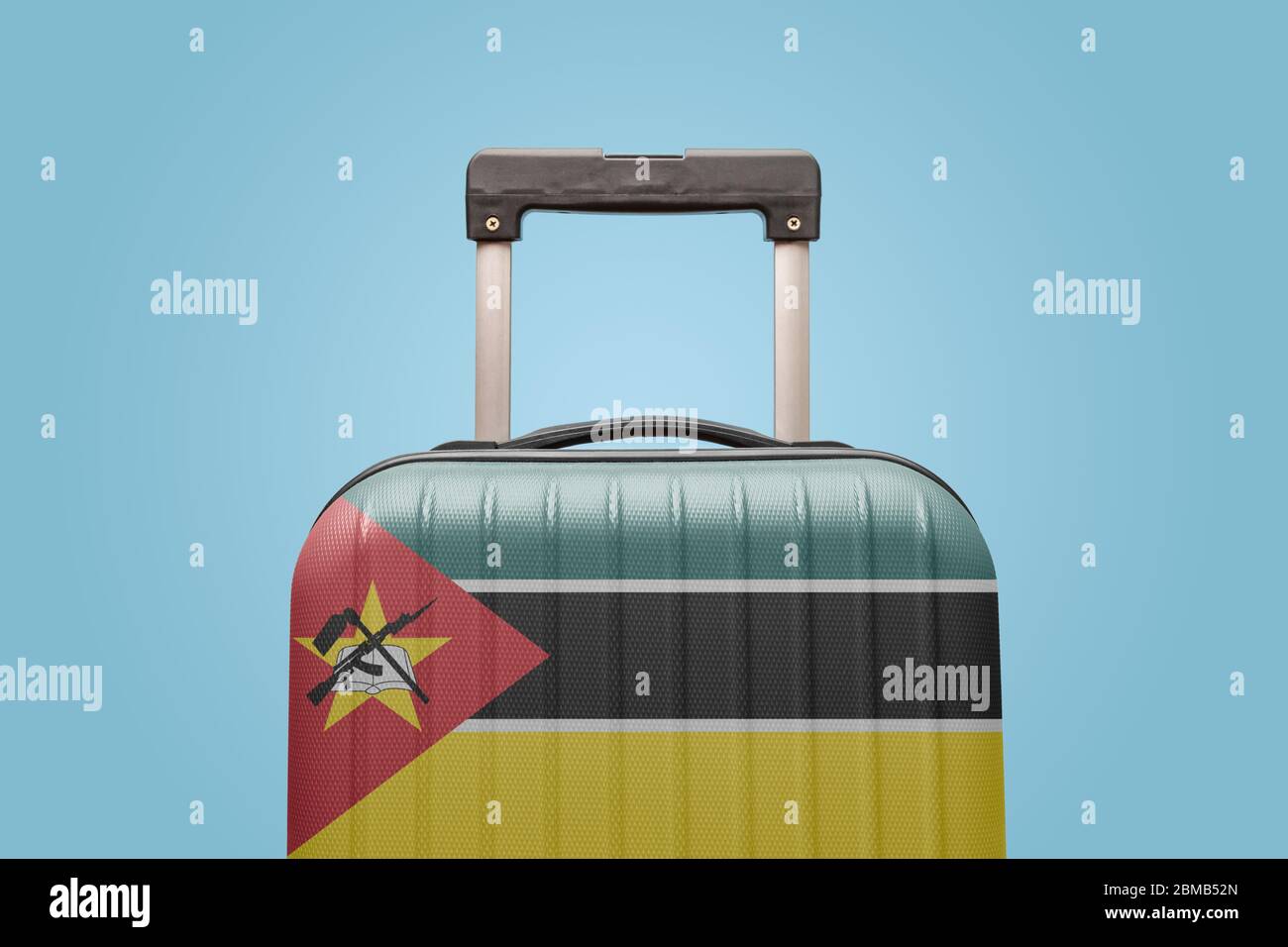 Suitcase with Mozambican flag design travel Africa concept. Stock Photo