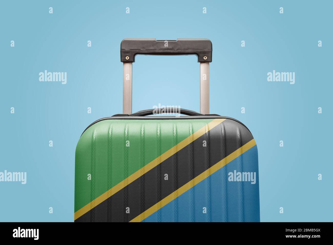 Suitcase with Tanzania flag design travel Africa concept. Stock Photo