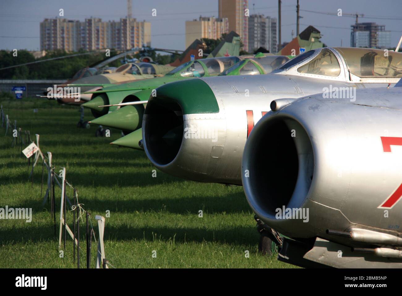 View of MiGs parked in line at the Ukraine State Aviation Museum - MiG-19 and MiG-17 in the foreground, MiG-21, MiG-23 and MiG-27 in the background Stock Photo