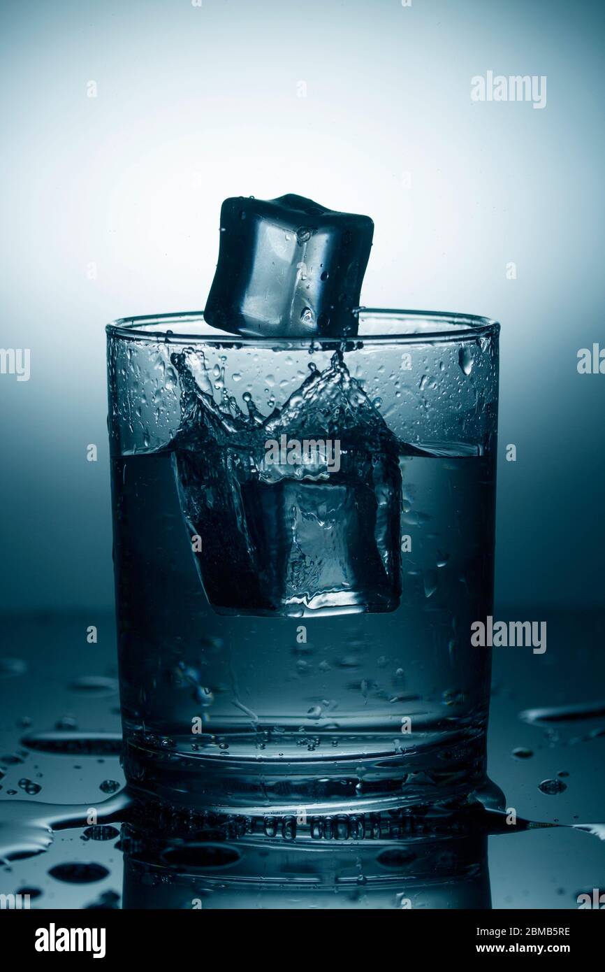 cold mineral water with ice. blue toned Stock Photo