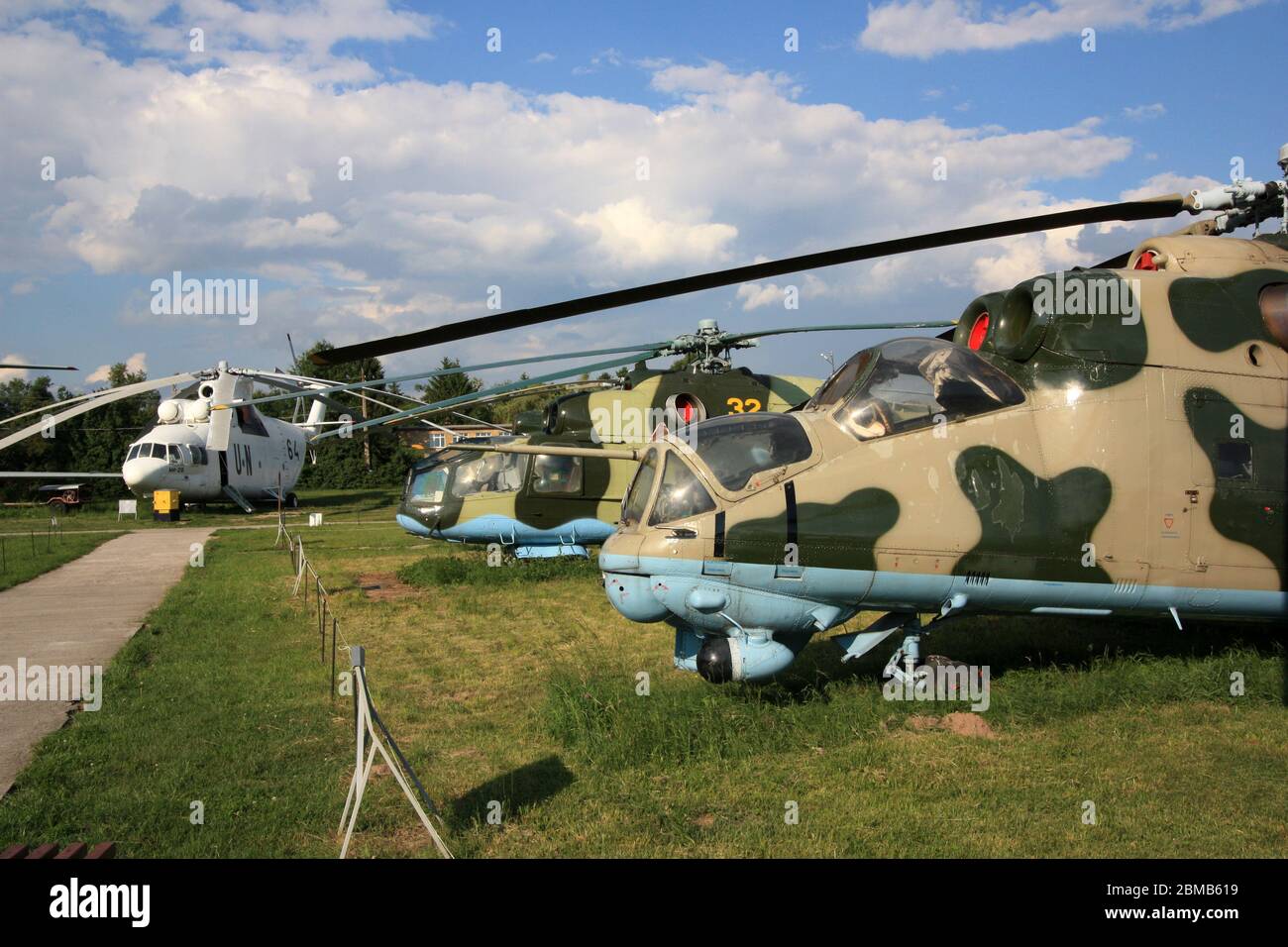 Soviet aviation legends next to each other, a Mi-24A 'Stakan', Mi-24D 'Hind' and a Mi-26 'Halo' at the Zhulyany State Aviation Museum of Ukraine Stock Photo