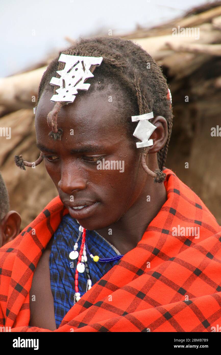 Portrait of a young Maasai tribesman. Maasai is an ethnic group of semi-nomadic people. Photographed in Tanzania Stock Photo