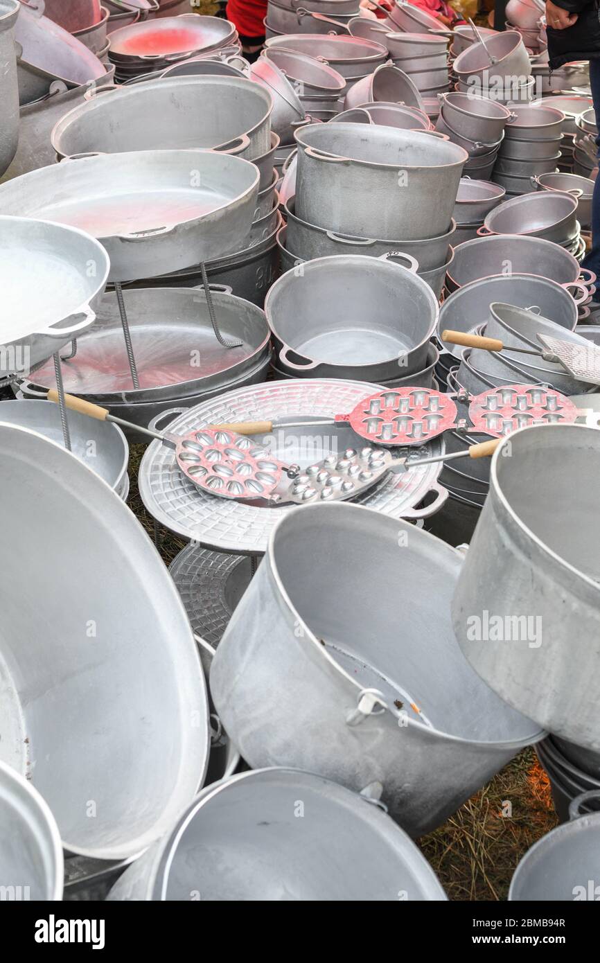 Gypsy market, bronze pots and pans for sale. Romanian minority handmade