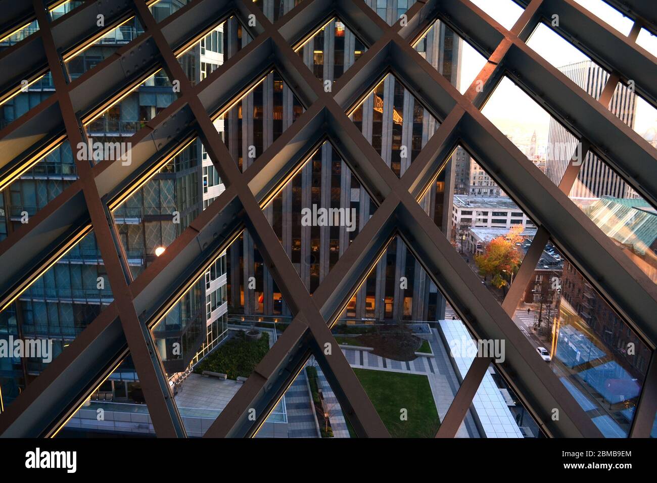 Seattle 2013, Public library interior. View of the streets outside the window trough the particular blue steel grid of the metal structure Stock Photo