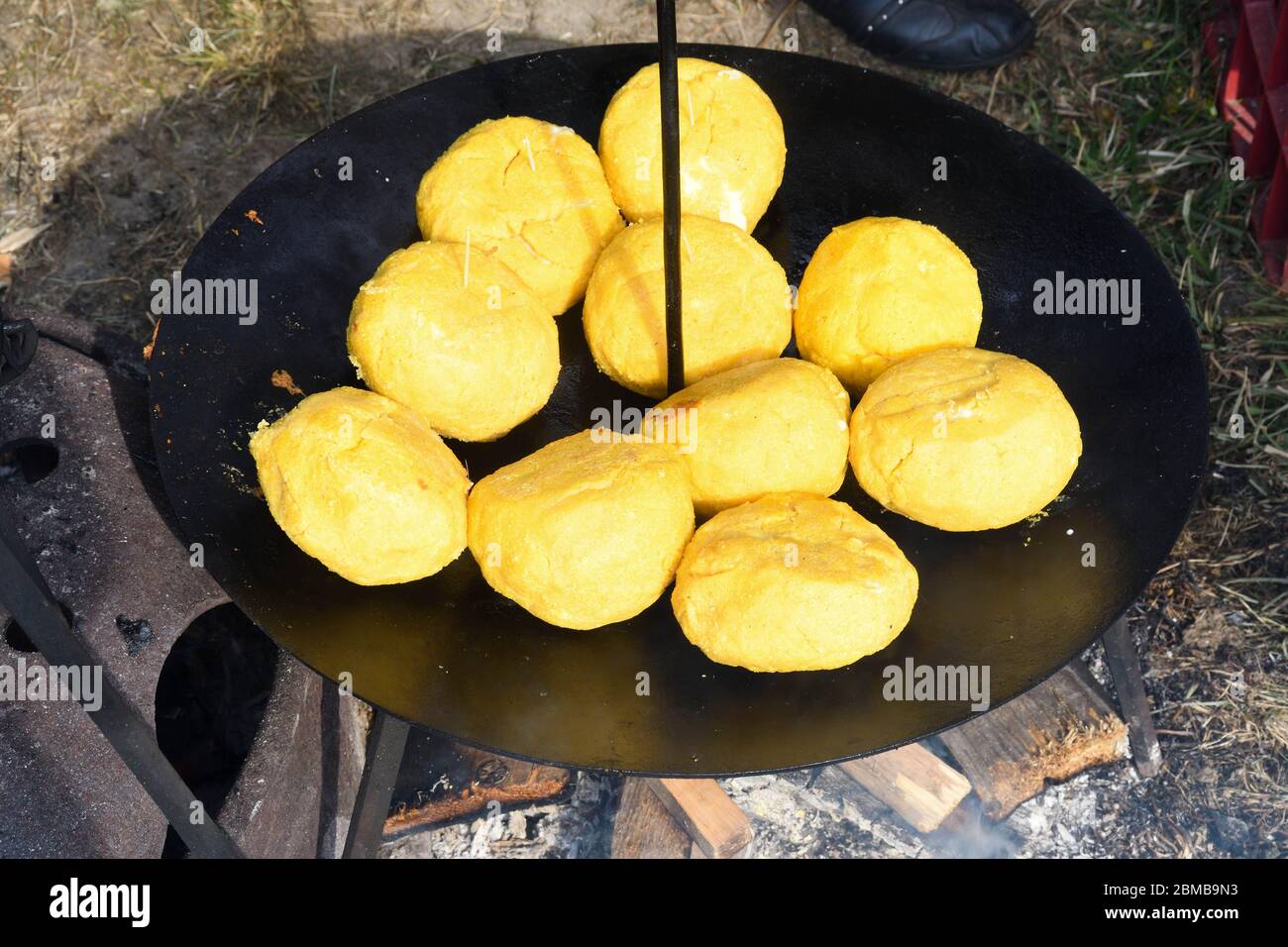 Balls of polenta and cheese in the middle of it, named bulz, a ...