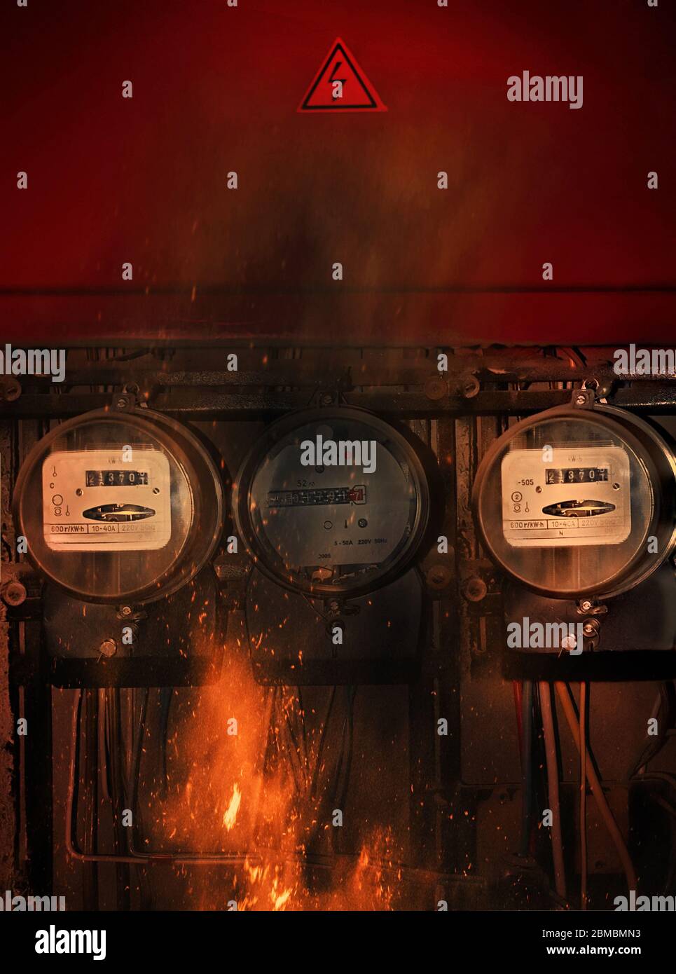 Energy Meter Exploding burning old electricity supply meters Stock Photo - Alamy