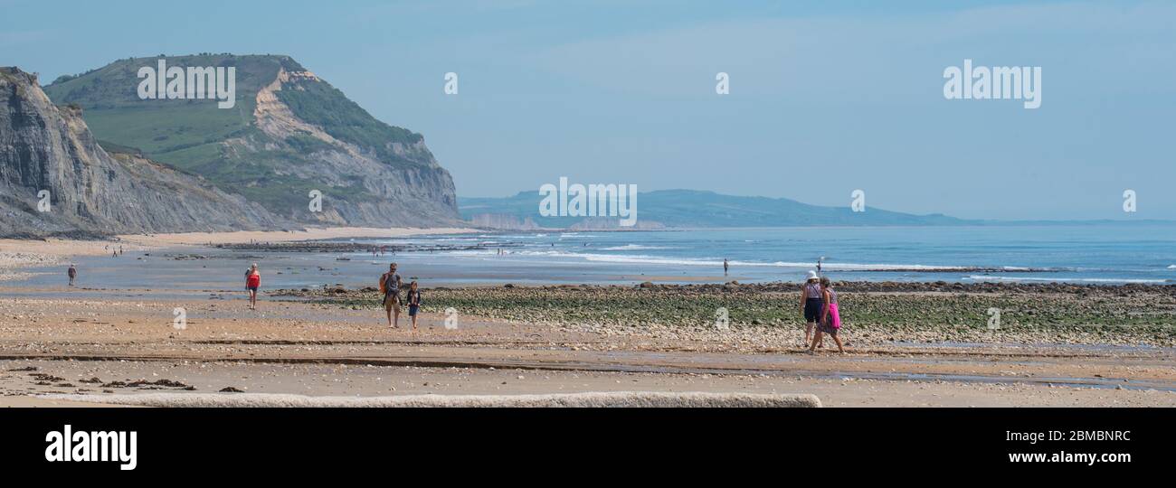 Charmouth Dorset, UK. 8th May, 2020. UK Weather: A hot and sunny bank holiday afternoon at Charmouth, West Dorset. Despite the beautiful weather he beaches remain quiet on the 75th aniversary of VE day as people continue to follow advice to stay at home during the coronavirus pandemic lockdown. Credit: Celia McMahon/Alamy Live News Stock Photo
