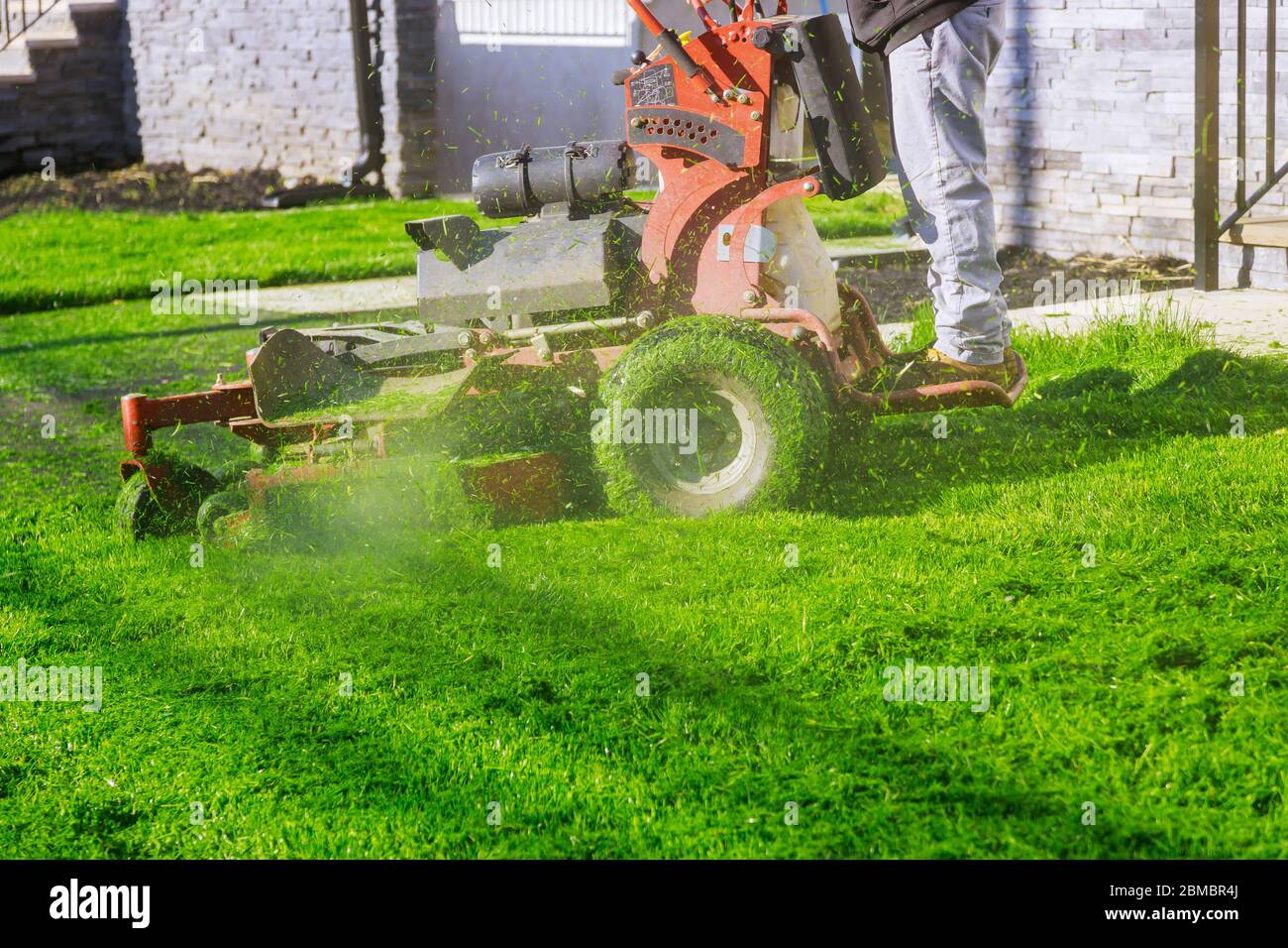 Motorized grass cutter hires stock photography and images Alamy