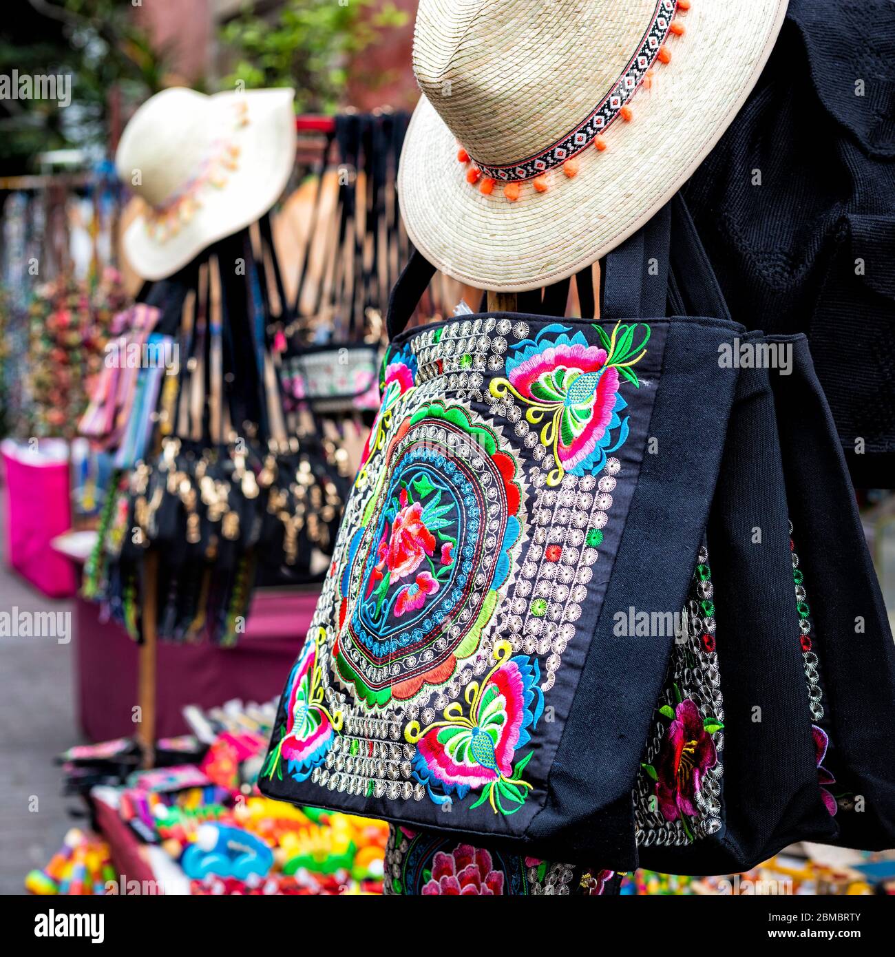 Intricately decorated purses hand in the Tlaquepaque, Jalisco street market in Mexico. Stock Photo