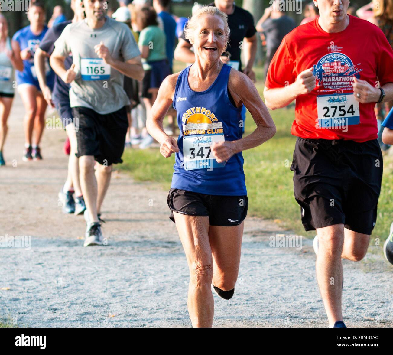 North Babylon, New York, USA July 2019 Women smiling in a crowd