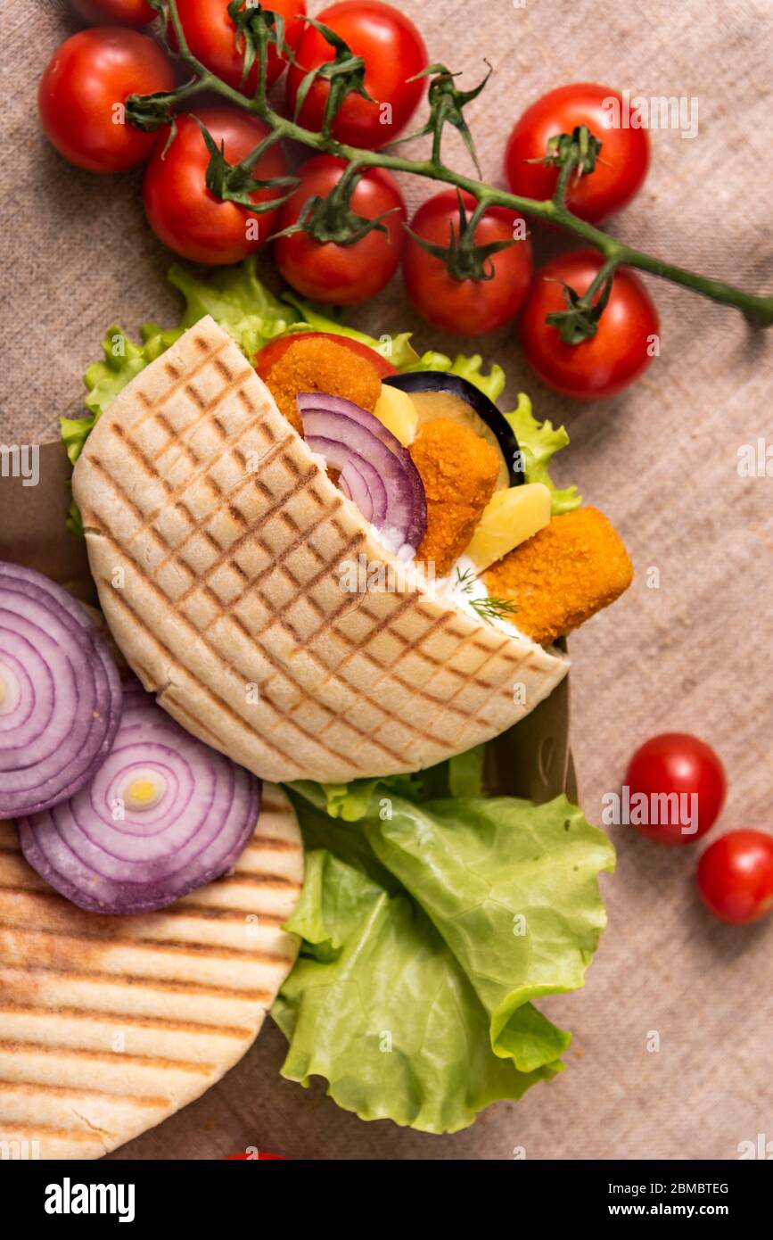 Doner Fish Pita doner kebab with green salad, tomatoes cherry, potato free ...
