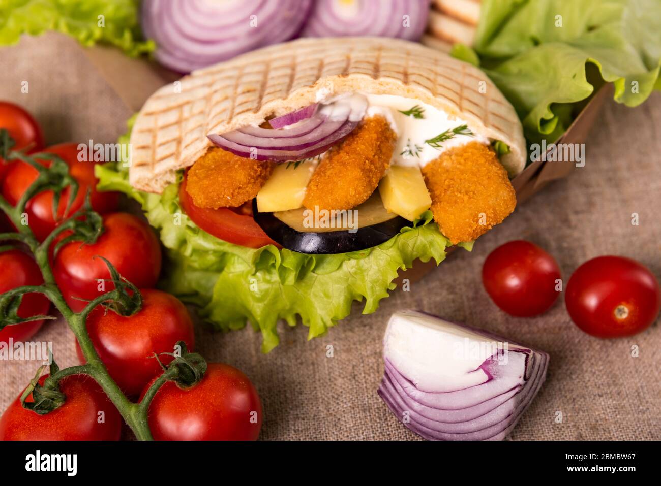 Doner Fish Pita doner kebab with green salad, tomatoes cherry, potato free ...