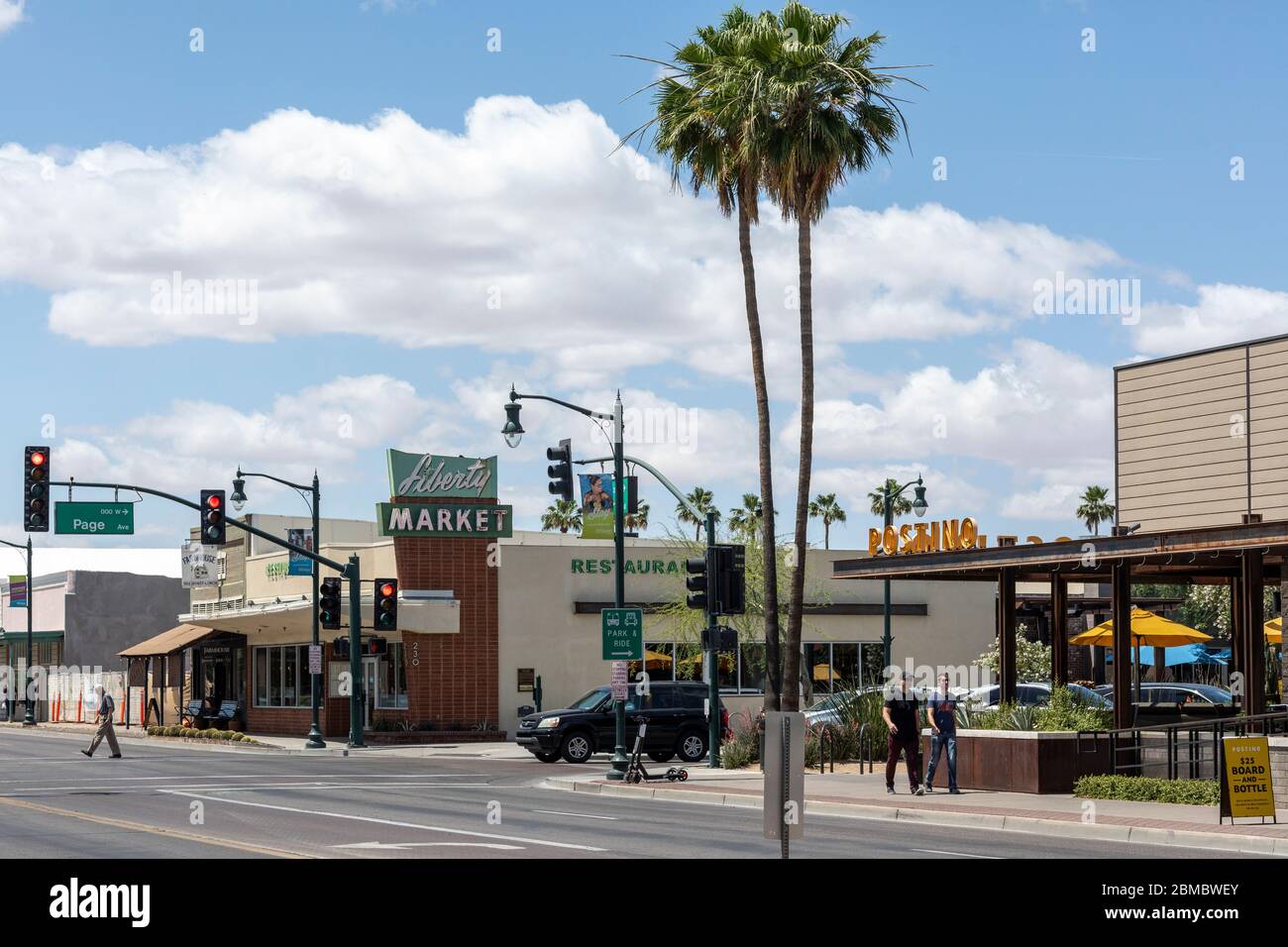 Street view of downtown Gilbert Arizona Liberty Market and palm trees