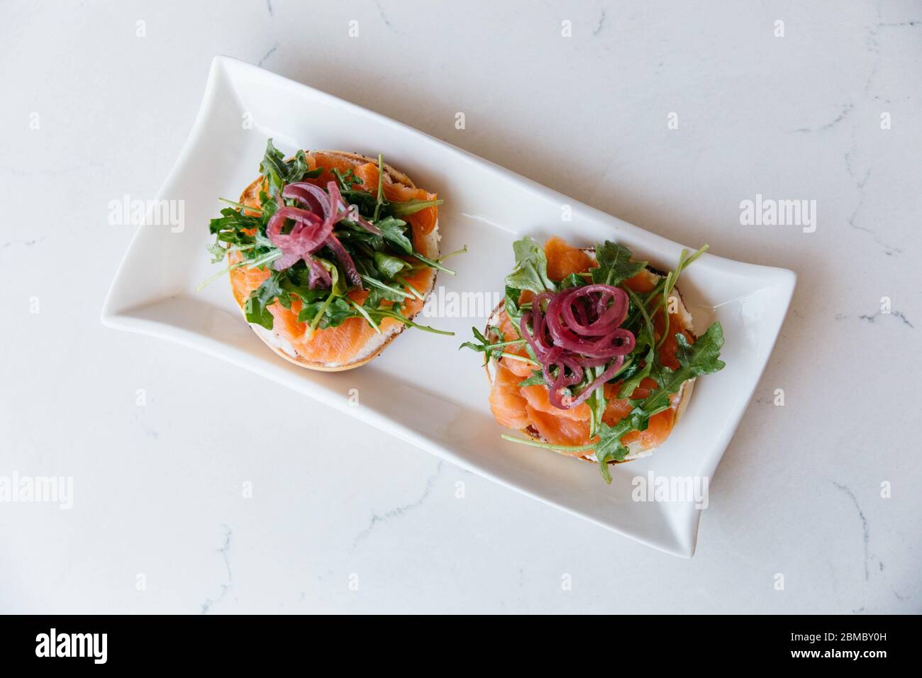 Lox Bagel at Restaurant on Marble Table Stock Photo Alamy