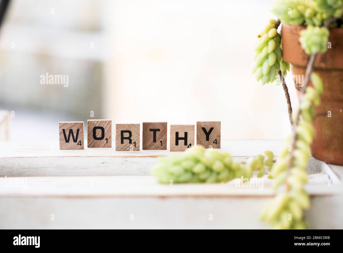 Worthy in block letters Stock Photo