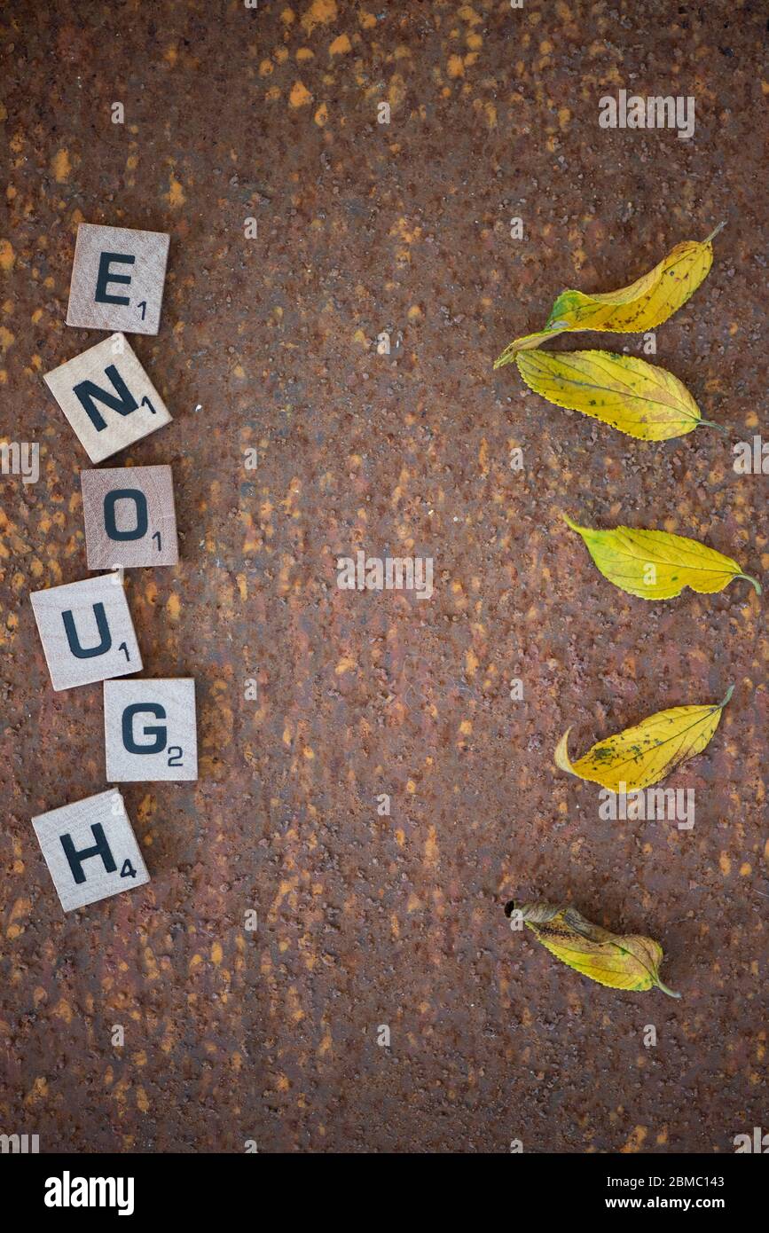 Enough in block letters Stock Photo
