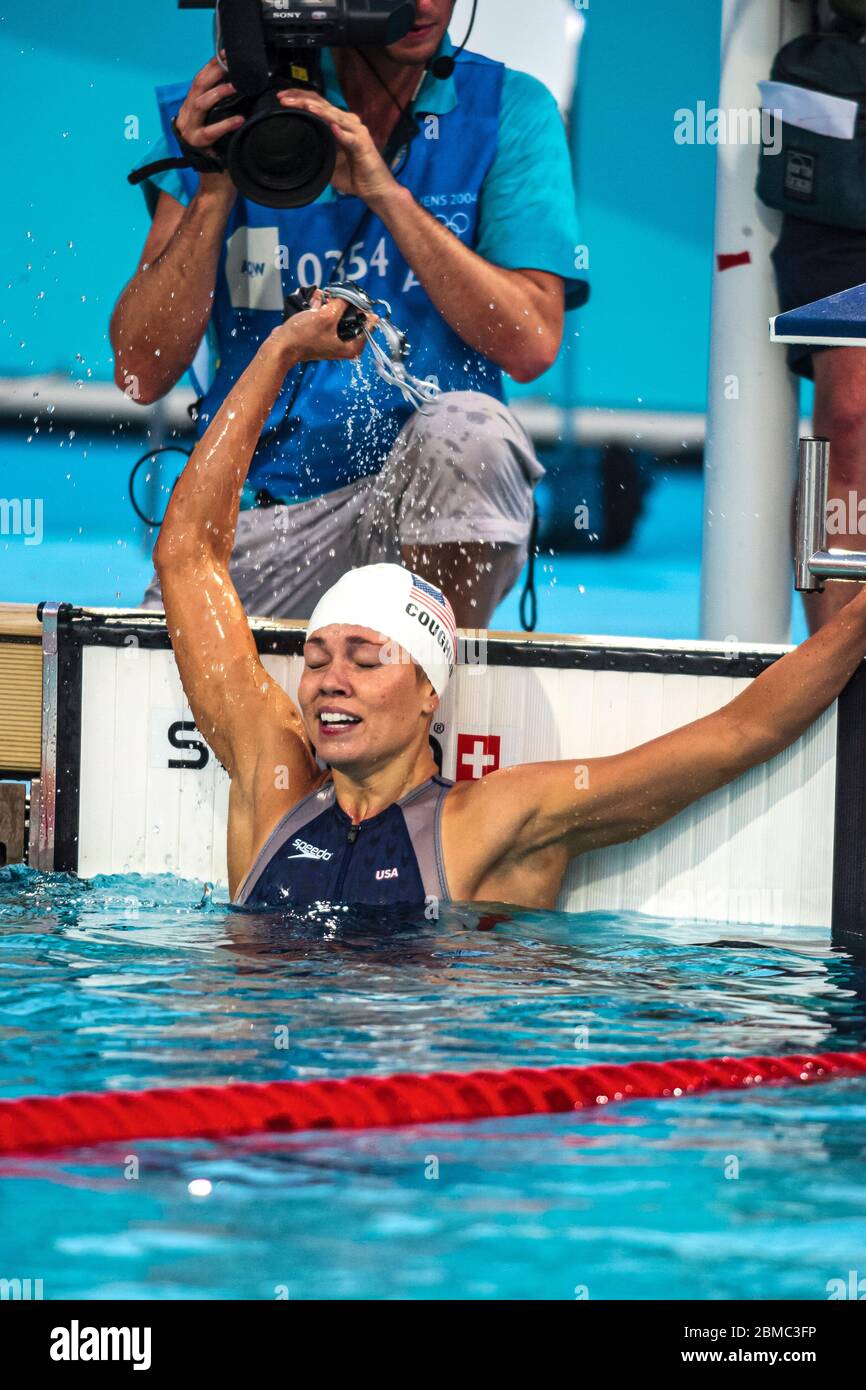Natalie Coughlin (USA) wins the gold medal in the  Women's 100 metre backstroke final at the 2004 Olympic Summer Games, Athens. Stock Photo