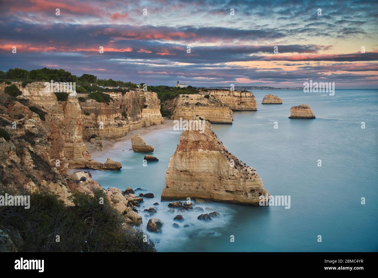 Photo of the rocks in the beach in Lagos Portugal at the sunset time Stock Photo
