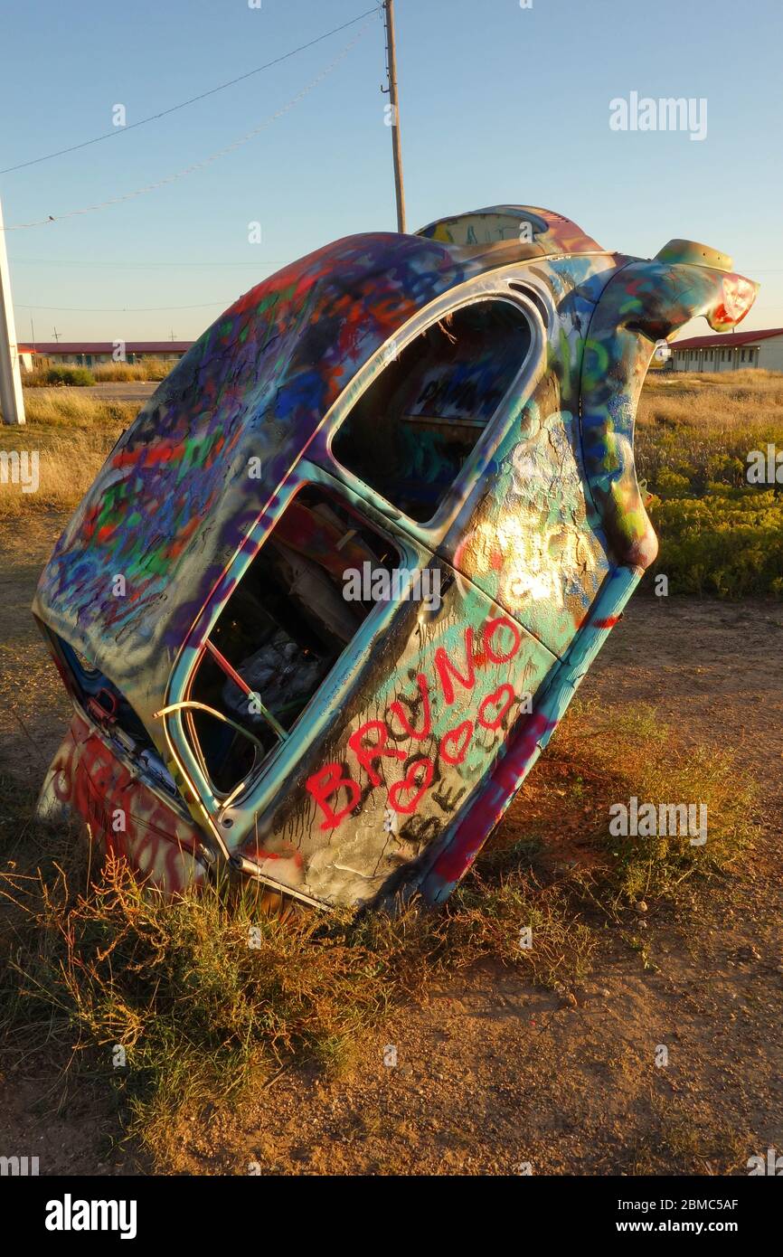 One of five Volkswagen Beetles buried by Slug Bug Ranch Stock Photo