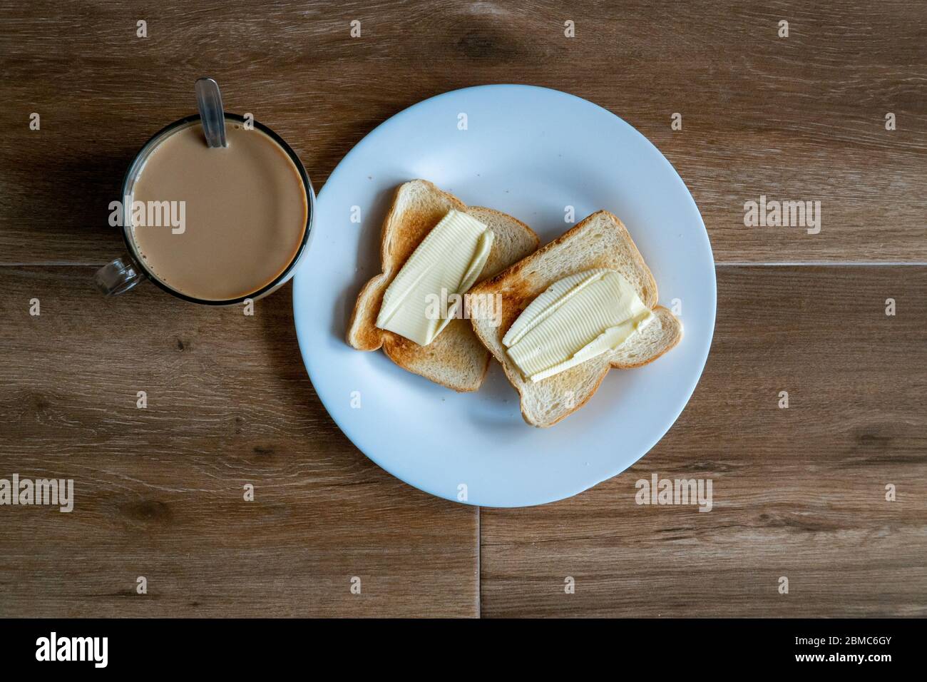 Cup Of Coffe With Milk And Two Slices Of Toasted Sandwich Buttered Bread On A White Plate Healthy Breakfast With Coffee Free Space For Text Top Vie Stock Photo Alamy Cup Of Coffe With Milk And Two Slices Of Toasted Sandwich Buttered Bread On A White Plate Healthy Breakfast With Coffee Free Space For Text Top Vie Stock Photo Alamy